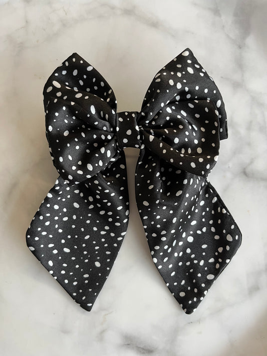 Black polka dot hair bow clip