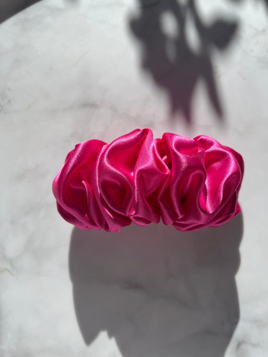 Bright pink scrunchie clip